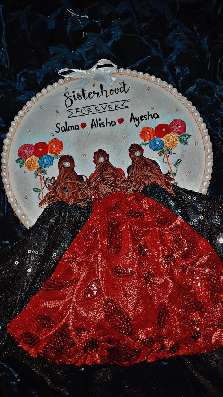 Sisterhood embroidery portrait with pearl-embellished hoop